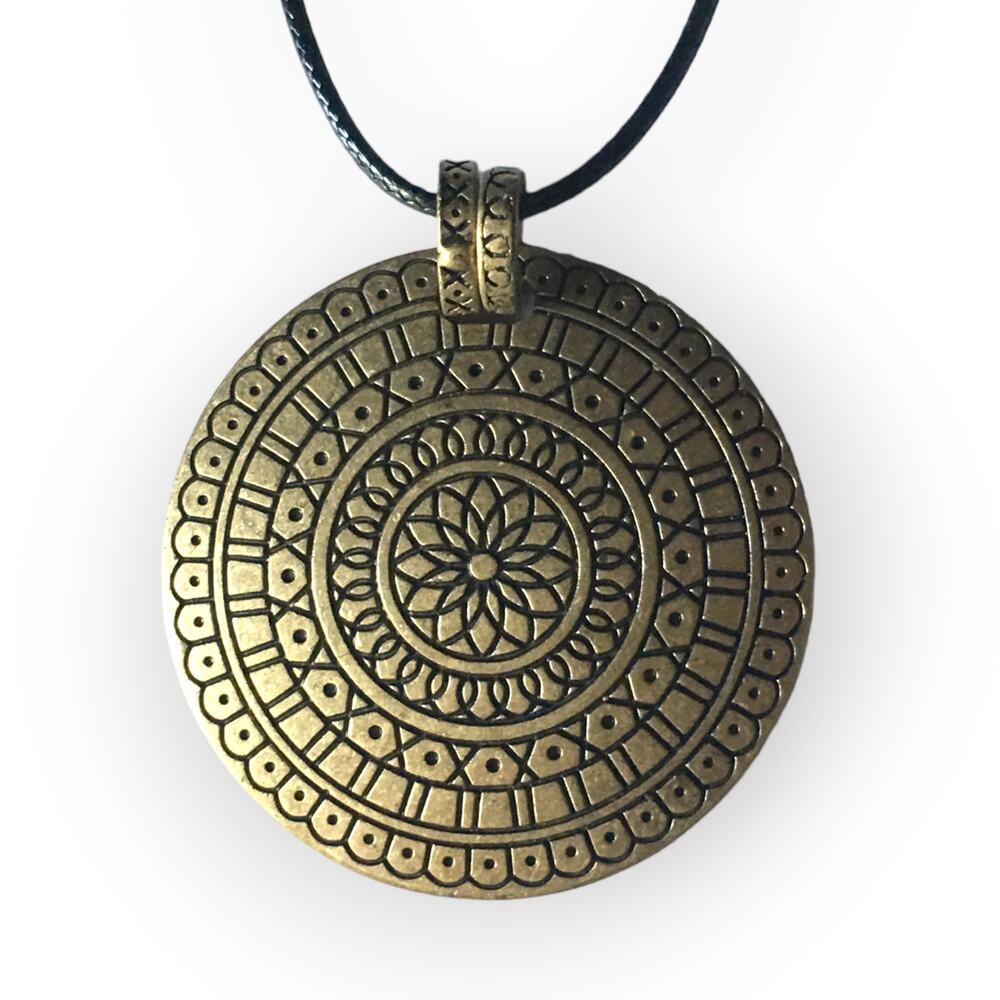 Brass tone Intricate patterned disc pendant necklace